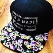 Image of Raw Caviar Limited Edition Black and Purple Snapback Floral