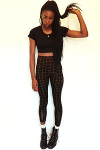 Image of high waisted stretch checked burnt orange leggings with pockets