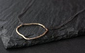 Image of simple organic metal necklace