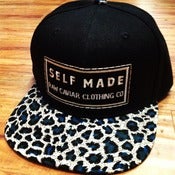 Image of Teal Cheetah with Teal Snap Raw Caviar Self Made Snapback