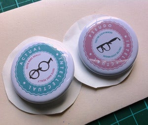 Image of Badges Buttons Pins.