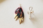 Image of The Get Free earrings.