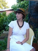Image of white eyelet wrap dress