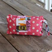 Image of diaper clutch - coral pink dots 