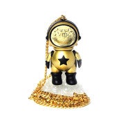 Image of Ron English Chris Brown Astronaut Skull Star Necklace Gold Dum English