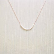 Image of Tiny Pearl Necklace - Silk Cord, Pearls, and Sterling Silver