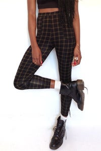 Image of high waisted checked green leggings with pockets