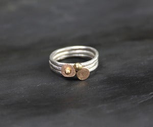 Image of Silver and gold stacking ring set