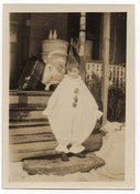 Image of BOY IN CLOWN COSTUME IN THE SNOW VINTAGE SNAPSHOT PHOTO 