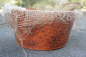 Image of Highly Textured, Tangerine Colored, Metal Wash Basin