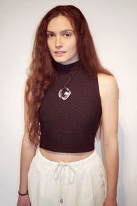 Image of textured stretch sleeveless turtle neck top