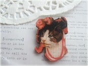 Image of Fancy Cat with Red Hat Brooch