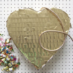 Image of Xanthe Highfield's gold heart piñata