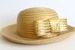Image of Vintage Hat. Gold straw. Gold bow.