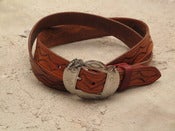 Image of mens belt with vintage indian buckle