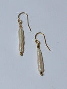 Image of White Stick Pearls in the Garden