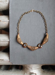Image of unearthed tribal cage necklace