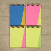 Image of neon triangle notebooks