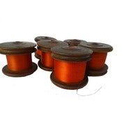 Image of Oak Bobbin With Vibrant Orange Silk