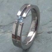 Image of Titanium Forked Tension Set Band Round Aquamarine Ring
