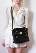 Image of black satchel