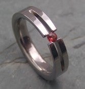 Image of Titanium Forked Tension Set Band Round Songea Sapphire Ring