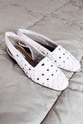 Image of white woven sandals