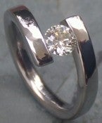 Image of Titanium Twist of FateTension Set Band Round 1/2 Carat Certified Near Colorless Diamond Ring