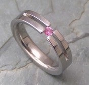 Image of Titanium Forked Tension Set Band Round Pink Sapphire Ring