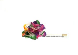 Image of purple floral lapel flower