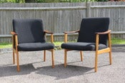 Image of Pair of vintage Danish style teak and beech wood armchairs circa 1960's