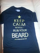 Image of LADIES KEEP CALM WHILE I RUB YOUR BEARD TSHIRT BLACK WITH GOLD PRINT 