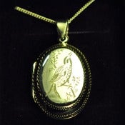 Image of Hand Engraved Silver Sitting Bird Locket