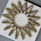Image of galaxy brass trivet