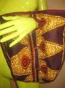 Image of triangle wrist tote