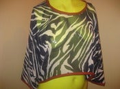 Image of sheer zebra top