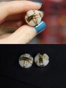 Image of 9/16" Golden Pearl Plugs!
