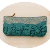 Image of roundy-bottomed tough ruffles zipper purse in vintage lace + teal