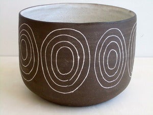 Image of dark brown stoneware circle bowl