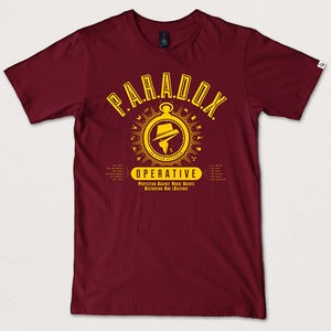 Image of “P.A.R.A.D.O.X. Operative” - Burgundy tee yellow print