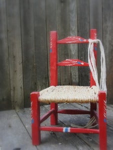 Image of Vintage Red Children's Chair with Wicker Seat