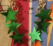 Image of green star fall earrings