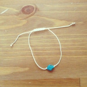 Image of turquoise bead white bracelet