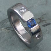 Image of Titanium Tension Blue Sapphire Ring With 2 Accent Diamonds