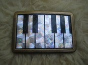 Image of METALLIC KEYBOARD RETRO BELT BUCKLE