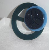 Image of vintage styled blue and blue buckle and button brooch
