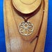 Image of flower child pendant
