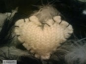 Image of The Looped Heart Ring in White with Black Thread Detail