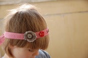 Image of hairband / sash, red, with brown embroidery