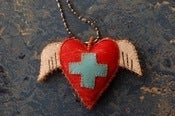 Image of Winged Heart with blue cross pendant